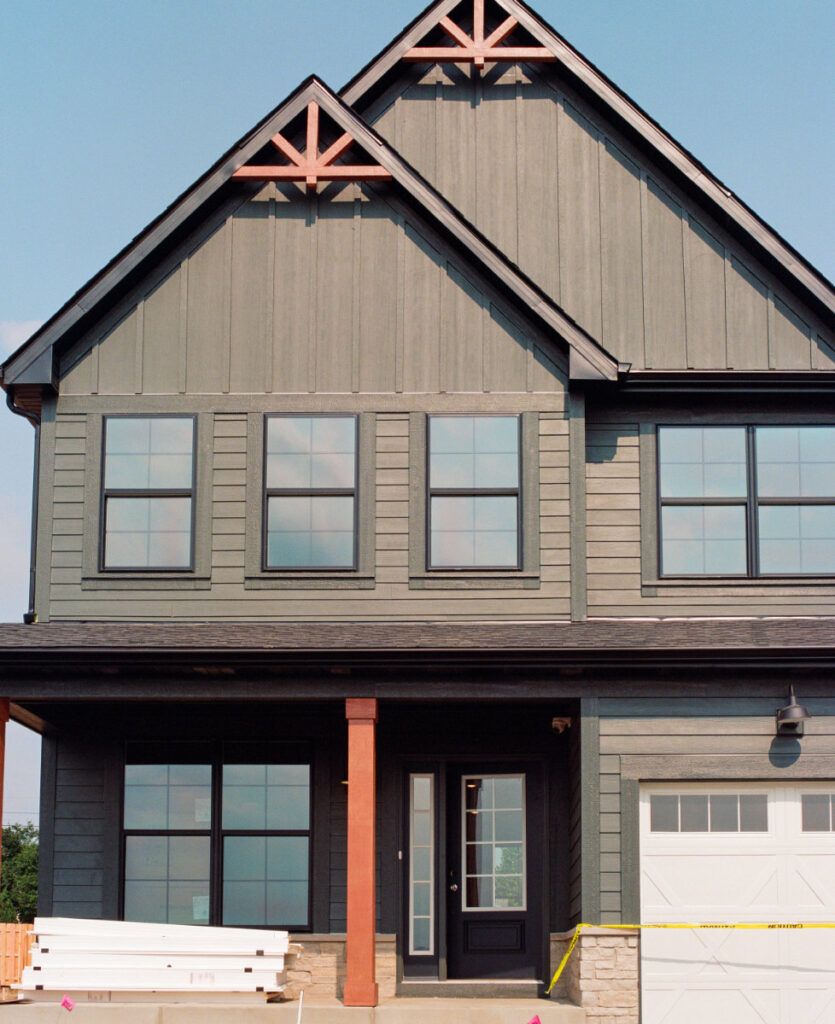 freshly painted new residential home exterior by tbj