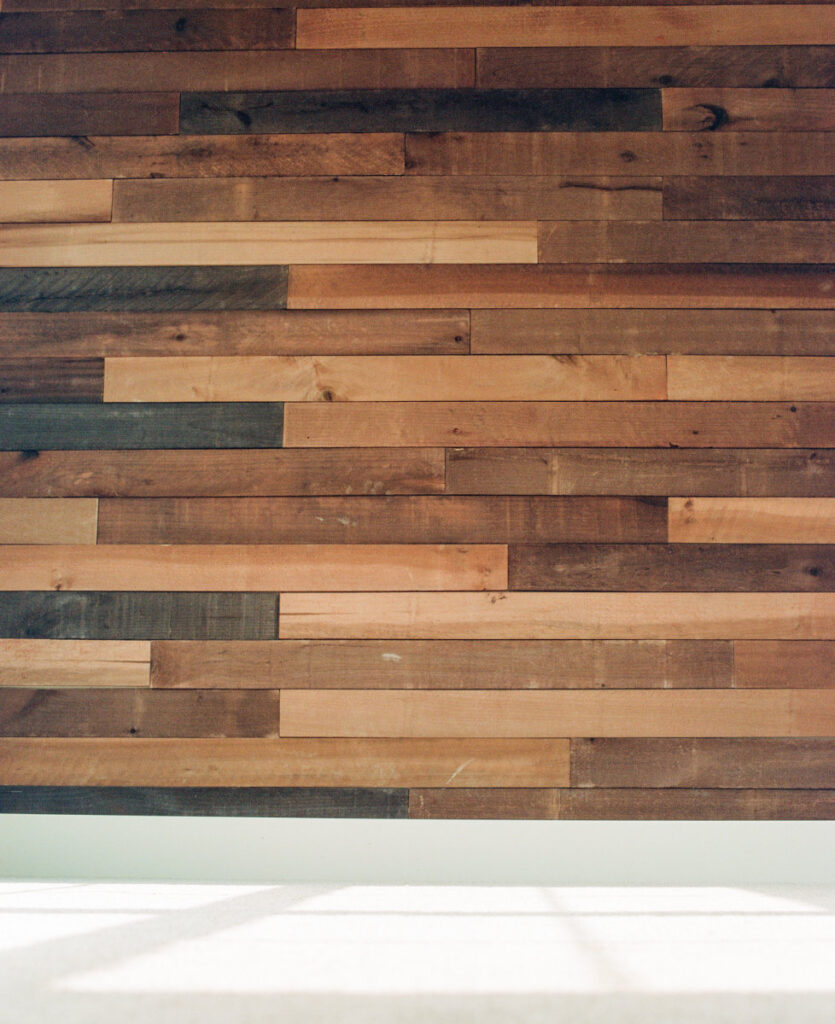 multiple color stained hardwood wall