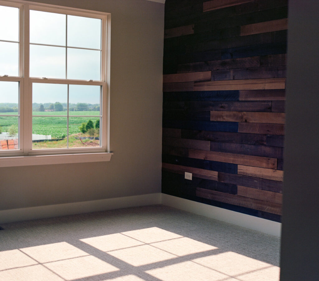 wood stained accent slatwall by tbj