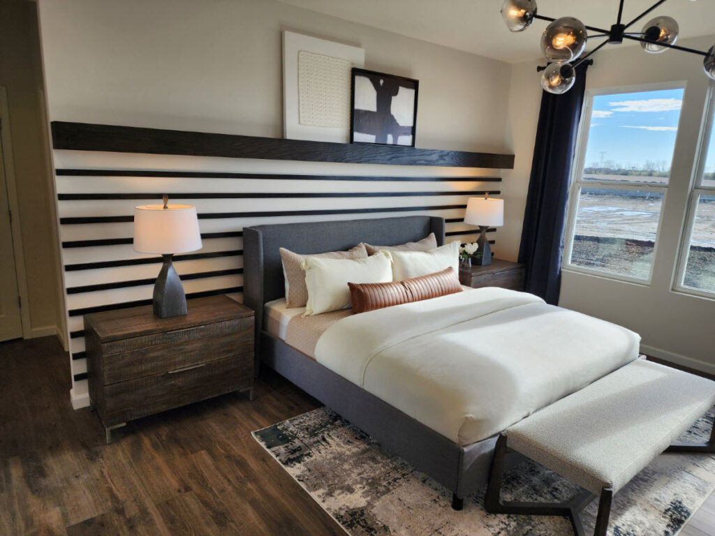 bedroom with decorative wood wall