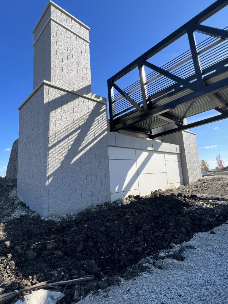 painted steel and concrete walking overpass 02