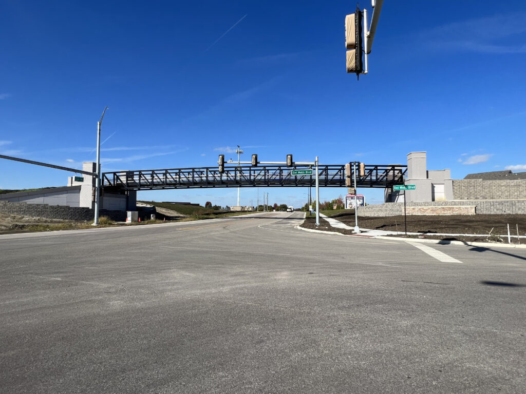 painted steel and concrete walking overpass 05